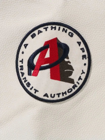 a bathing ape black white varsity jacket